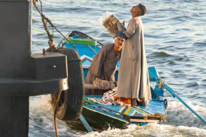 3. Vendedores del Río Nilo. Foto - Stock