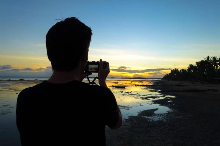 1. Fotógrafo en la playa. Foto - Alamy