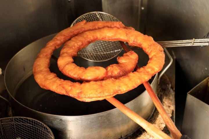 3. Churro gordo en aceite. Foto - Alamy