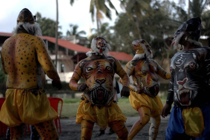 1. Danzantes de Pulikali. Foto - Alamy