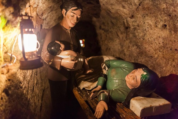 4. Escenificación de nacimiento en los túneles de Vinh Moc. Foto - Alamy